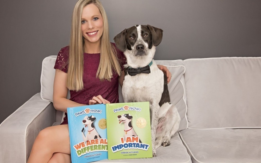 AUTHOR, DOG VISIT K-2 STUDENTS