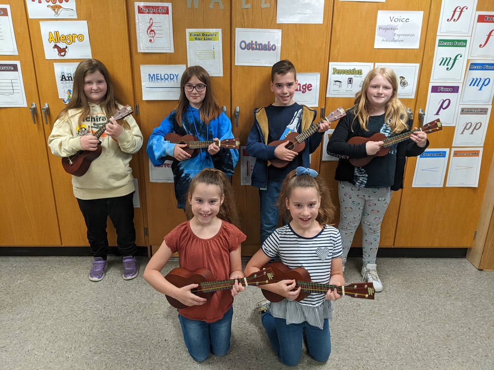 uke club 6 students with their ukulele 