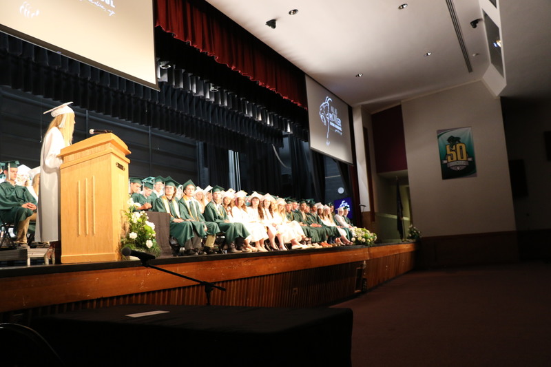 Mindy Isaman, Class of 2022 president, addresses the commencement gathering.